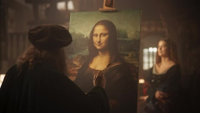 Re-enactment Documentary Scene for The Process of the Creation of the Mona Lisa Painting: The Genius Leonardo da Vinci Making the First Layer of Shadow in his Masterpiece on Canvas in his Art Workshop
