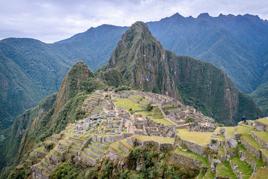 Fototapeta The path to Machu Picchu, the high mountain capital of the Inca tribe, a 15th century citadel site, buildings and view of the plateau and Andes mountains.