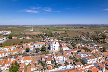 Fototapeta na wymiar Castro Verde Aerial view and its Royal Basilica, built in the 16th century, includes a museum where sacred pieces are exhibited. It is located in the Alentejo region, a tourism destination, Portugal.