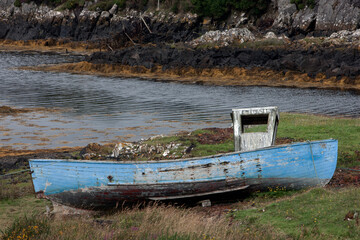 Westcoast Ireland. Conemara. Abandoned blue wooden fishing boat. 