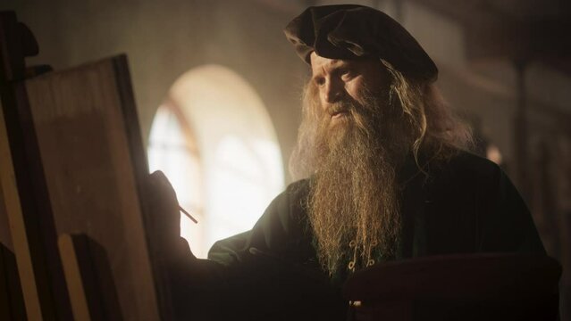Representation of Historical Era: Wide Portrait of the Genius Leonardo Da Vinci Painting his Muse and Creating a Masterpiece in his Art Workshop. Talented Renaissance Painter Practicing his Craft
