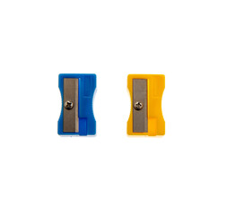 Blue and yellow pencil sharpeners isolated on transparent, top view, PNG, School supply