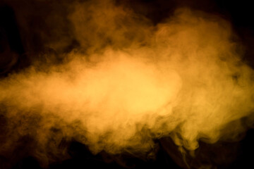 Yellow steam on a black background.