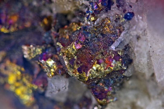Golden background. Gold. Ore close-up. Nugget. Nugget close-up background. Crystals.