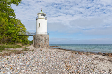 Taksensand Fyr, lighthouse on Danish Baltic Sea island of Als - obrazy, fototapety, plakaty