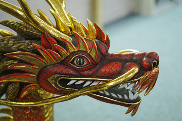 Balinese version of head dragon carving at art center