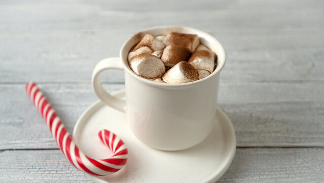 Cocoa marshmallows in traditional New Year's chocolate with caramel.
