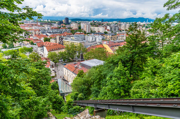 A view along the funicular railway leading up to the castle above Ljubljana, Slovenia in summertime - obrazy, fototapety, plakaty
