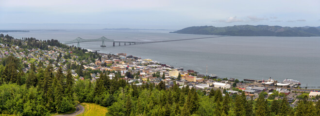 Astoria Oregon - A panoramic Spring day overview of port city Astoria and the Astoria-Megler Bridge, near the mouth of Columbia River at the Pacific Ocean. Oregon, USA. © Sean Xu