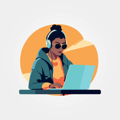 woman working on computer with headphones