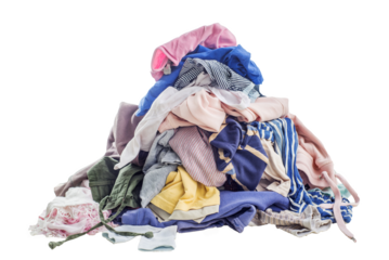 Used clothes in a pile. Sorting and cleaning second-hand. Preparing for washing. Isolated