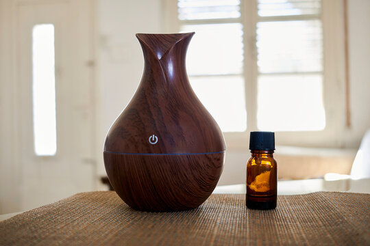 Electronic aromatizer for aromatherapy, wellness concept. Aromatic essence oil