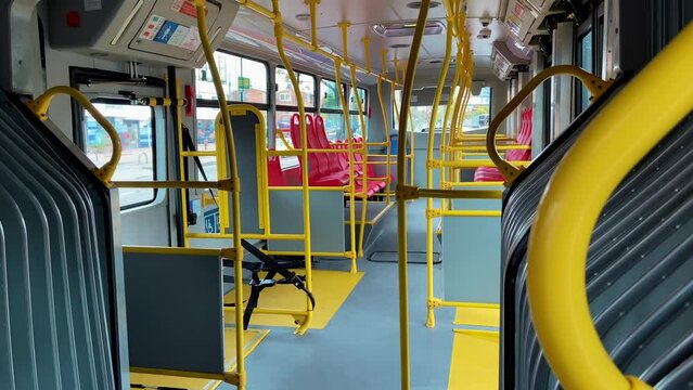 Bogota public service bus, transmilenio, empty bus driving through the city of Bogota