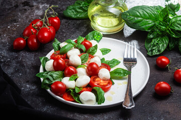 Caprese salad with tomato, mozzarella and basil