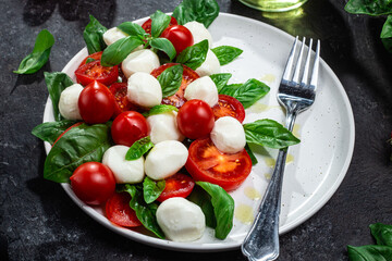 Caprese salad with tomato, mozzarella and basil