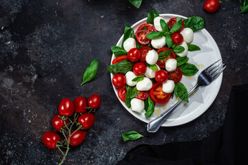 Caprese salad with tomato, mozzarella and basil