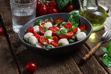 Caprese salad with tomato, mozzarella and basil