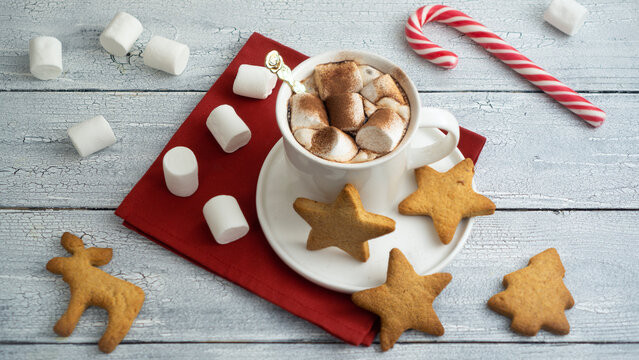  Cup with hot chocolate and marshmallows. Flat lay