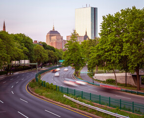 Boston in Massachusetts, USA at sunrise showcasing the Backbay neighborhood with its skyscrapers and historic buildings.