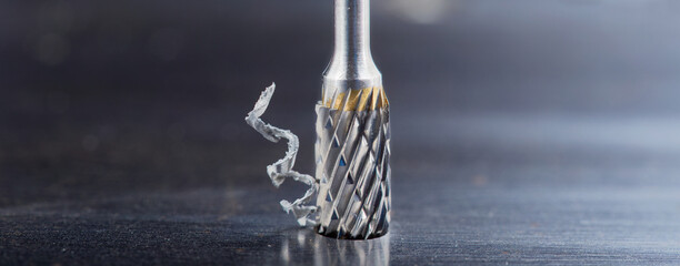 Milling cutter make sink in hole in steel billet. Locksmith work.