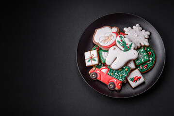 Fototapeta na wymiar Beautiful Christmas or New Year colorful homemade gingerbread cookies