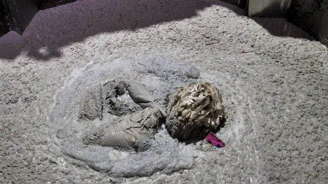 A large vat in which wet paper is boiled in the process of recycling waste paper. Secondary raw materials and non-waste production. Reuse paper. Pulp cooking. pulping. cellulose