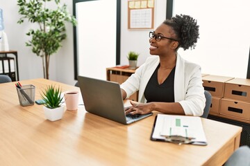 African american woman business worker using laptop working at office