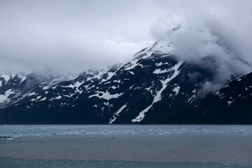 Cruise to Hubbard Glacier Bay in Alaska with floating ice bergs and drift ice floes on ocean water...