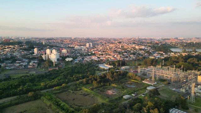 Aerial view of the region of Interlagos and Cidade Dutra in S&atilde;o Paulo. Houses, buildings and car traffic during late afternoon in 2023.