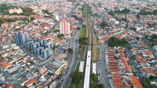 Aerial view of the region of Interlagos and Cidade Dutra in S&atilde;o Paulo. Houses, buildings and car traffic during late afternoon in 2023.