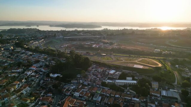 Aerial view of the region of Interlagos and Cidade Dutra in S&atilde;o Paulo. Houses, buildings and car traffic during late afternoon in 2023.