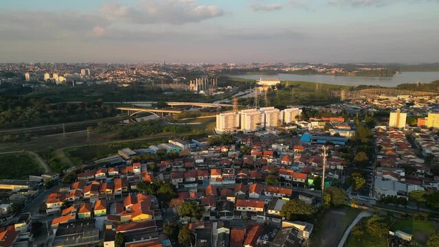 Aerial view of the region of Interlagos and Cidade Dutra in S&atilde;o Paulo. Houses, buildings and car traffic during late afternoon in 2023.