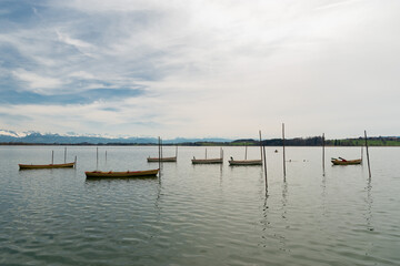 Obraz premium Small boats on the lake Pfaeffikersee in Zurich in Switzerland