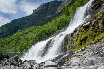 Close view on Geiranger fjord waterfalls, accessible only from water. Popular kayak trip destination. Geirangerfjord, Norway.