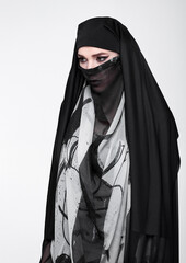 Beautiful eyes woman wearing fashion burka on grey background