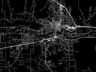 Vector road map of the city of  Grants pass Oregon in the United States of America with white roads on a black background.