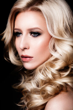 Luxury woman portrait with perfect hair and make-up blonde