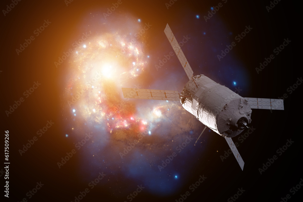 Poster cargo spacecraft - the automated transfer vehicle over spiral galaxy. elements of this image furnish