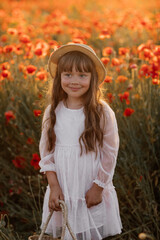 Portrait of cute girl in white dress and straw hat in field with poppies in evening at sunset, happy child, Stylish kid, Summer countryside nature flowers, Female relaxing, Rural simple life, family