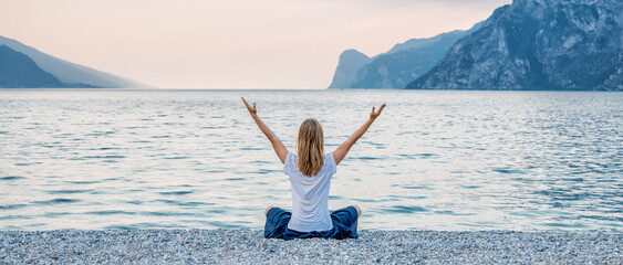 serenity and yoga practicing at the lake Garda