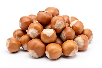 Obraz premium a pile of Hazelnuts sitting on top of each other isolated on white background, created by Generative AI