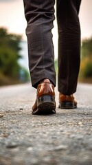 Businessman walking on a road to success, close up leather business shoes walking, goal and target concept