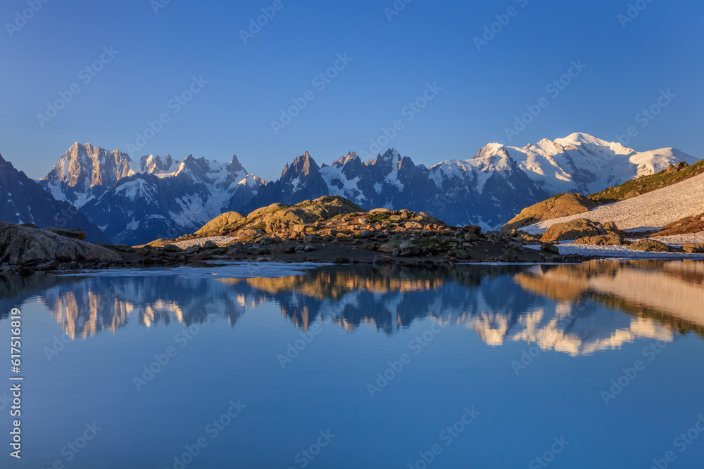 Wall mural mont blanc massif reflected in lac blanc, graian alps, france