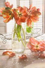 Colorful tulips on wooden table