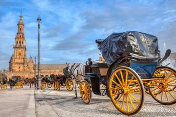 Parked Horse drawn carriages at Plaza de Espana in Seville, Andalusia, Spain. Spain Square