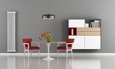 Modern dining room with round table, red chair and sideboard on wall - 3d rendering