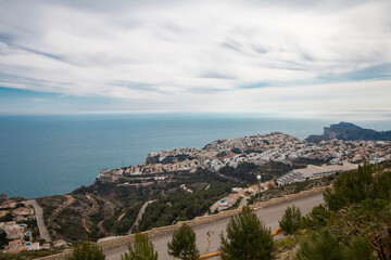 Fototapeta na wymiar Panoramic view of Cumbre del Sol in Spain, villas on the hills and the sea