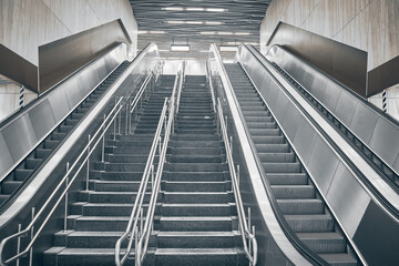 Empty staircase and escalators at metro station