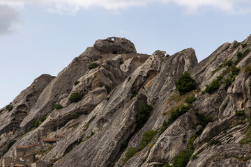 View of Pietrapertosa and Castelmezzano. Two beautiful villages built on the Lucanian Dolomites in Italy. Connected by a zipline that crosses the valley adrenaline-pumping experience. Day and sunset.