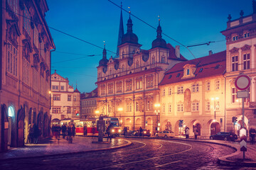 Fototapeta premium Czech Republic Prague square with old tram public transport dark evening street blue sky